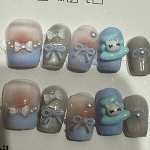 Hand designed “Hello Kitty” Nails